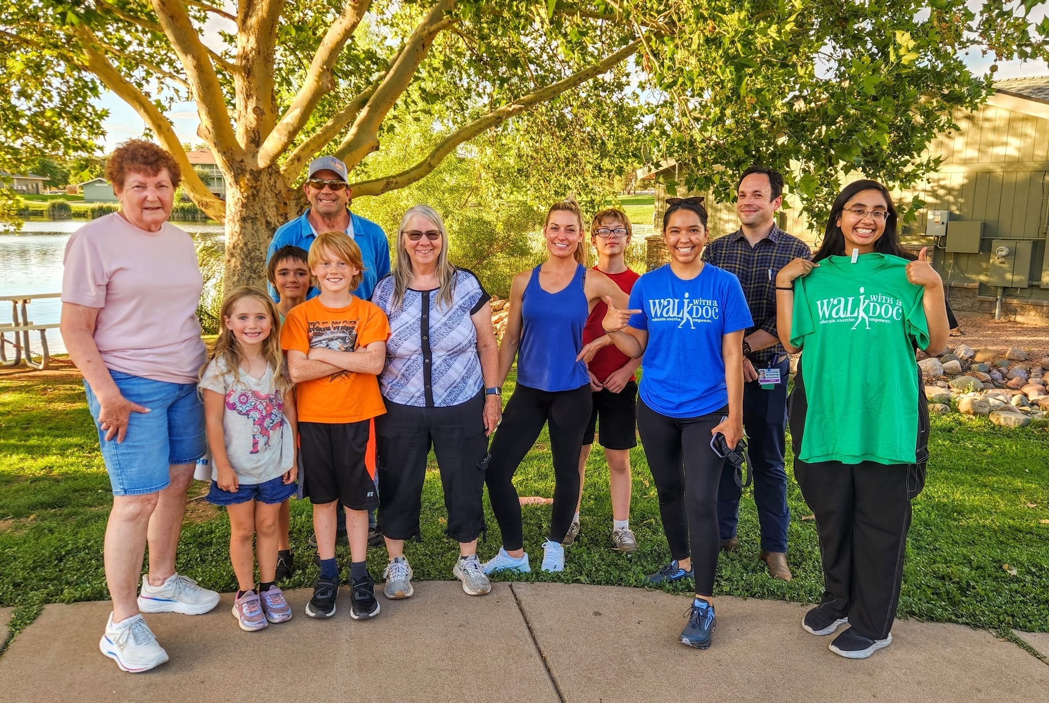 Community members gathered outdoors for a Walk with a Doc event